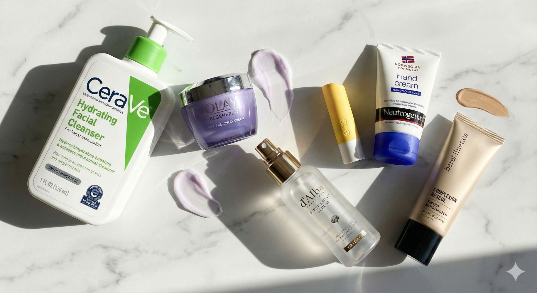 Flat lay of daily skincare essentials featuring hydrating cleanser, night cream, spray serum, and hyaluronic acid on a white marble counter